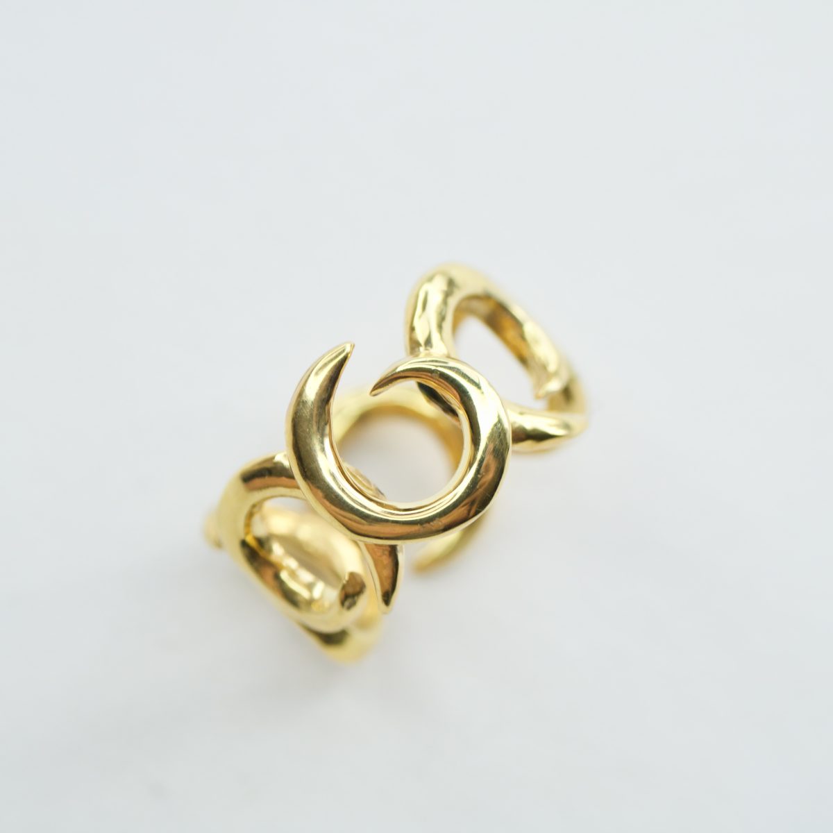 Selene statement curve gold band ring